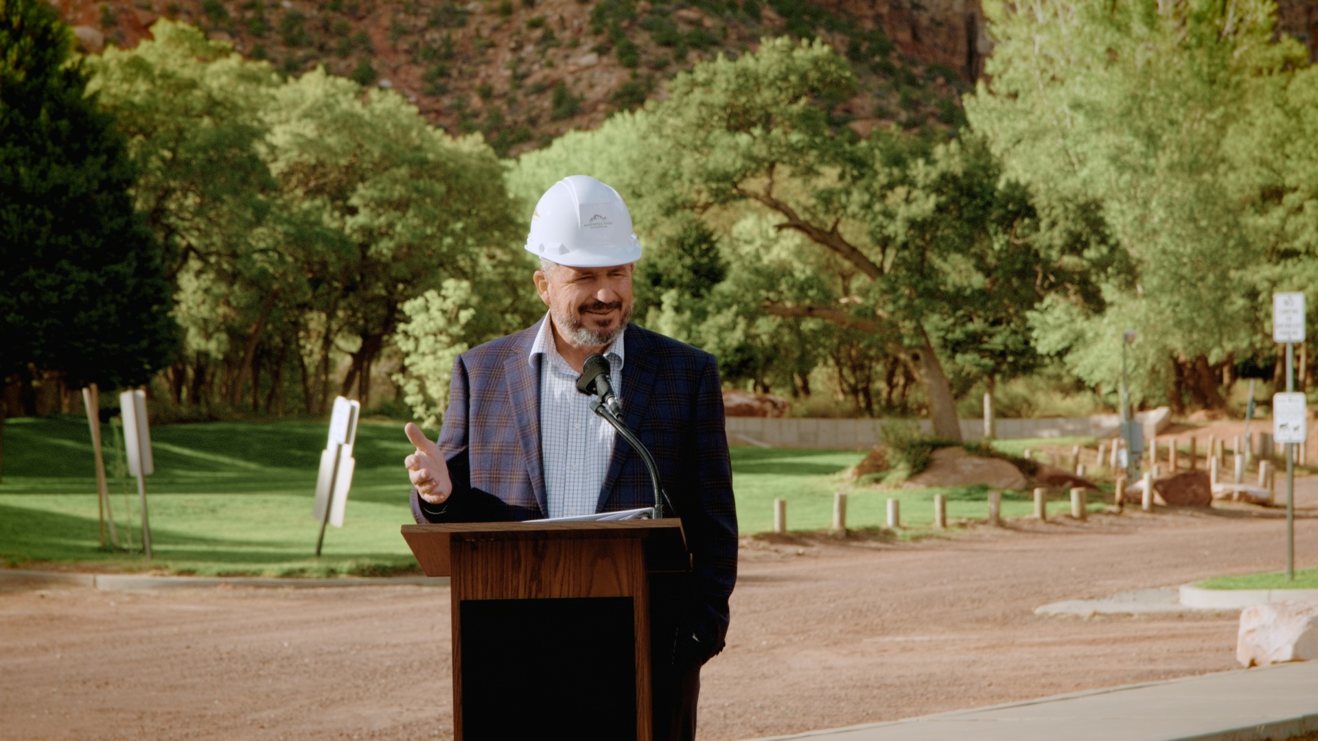 Speaker delivering remarks at the Maxwell Park groundbreaking